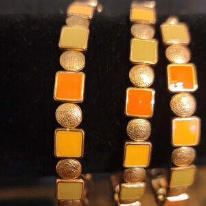 Spiral bracelet. Orange / gold